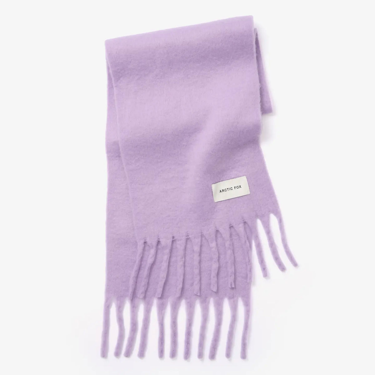 A light purple knit scarf with fringe ends and a small white brand label reading 'Arctic Fox', photographed on a clean white background.