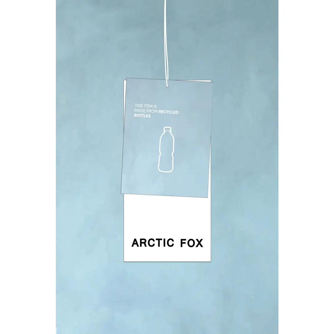 A hanging product tag for Arctic Fox, made from recycled bottles, with a translucent blue upper section and a white lower section on a light blue background.
